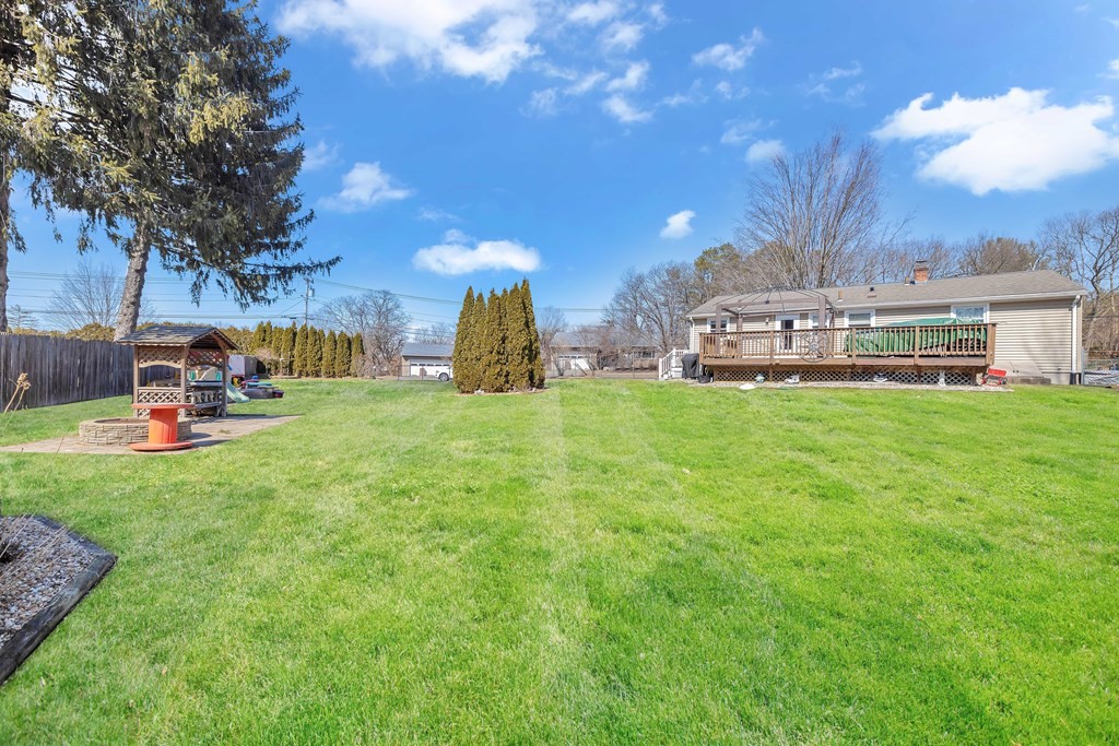 20 Murphy Lane Chicopee, MA 01020 - Photo 20 of 22 a view of a house with a big yard and a large tree