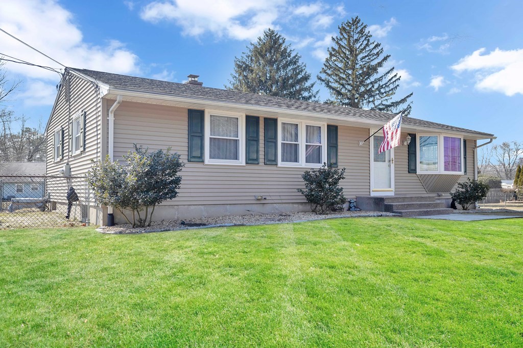 20 Murphy Lane Chicopee, MA 01020 - Photo 22 of 22 a view of a house with a yard and potted plants