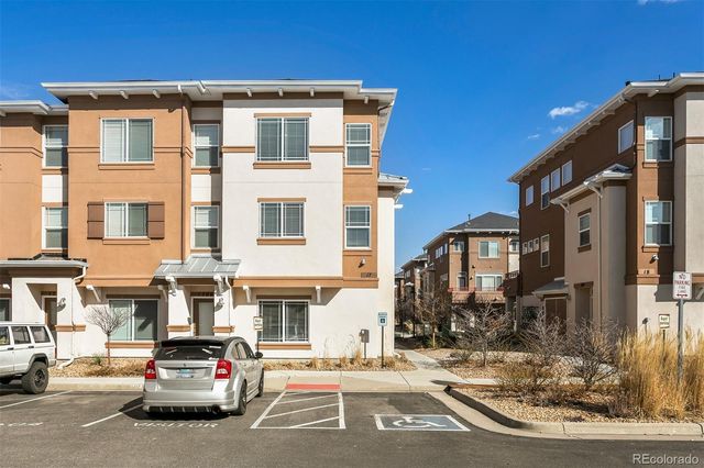 a car parked in front of a building