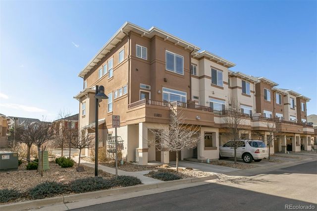 a front view of a building with multiple windows