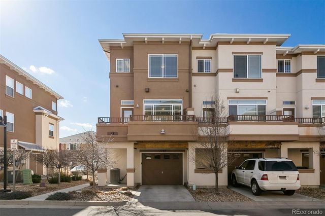 a view of a balcony with city view
