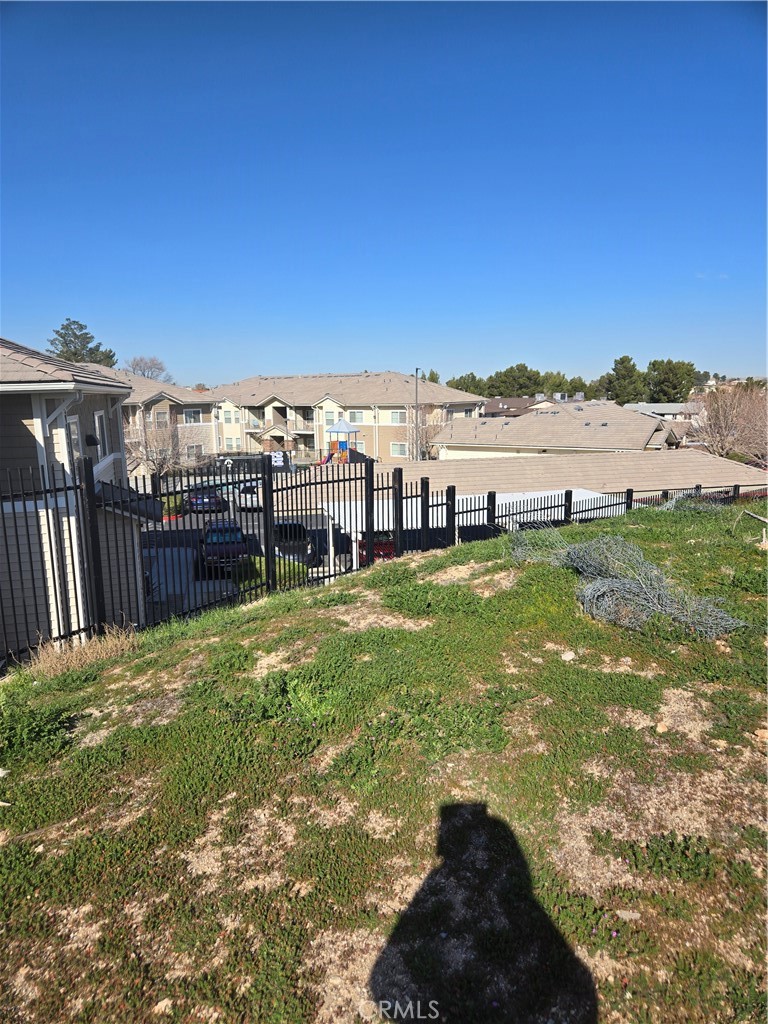 14140-14146 Rodeo Drive Victorville, CA 92395 - Photo 2 of 11 a view of a garden with an outdoor space