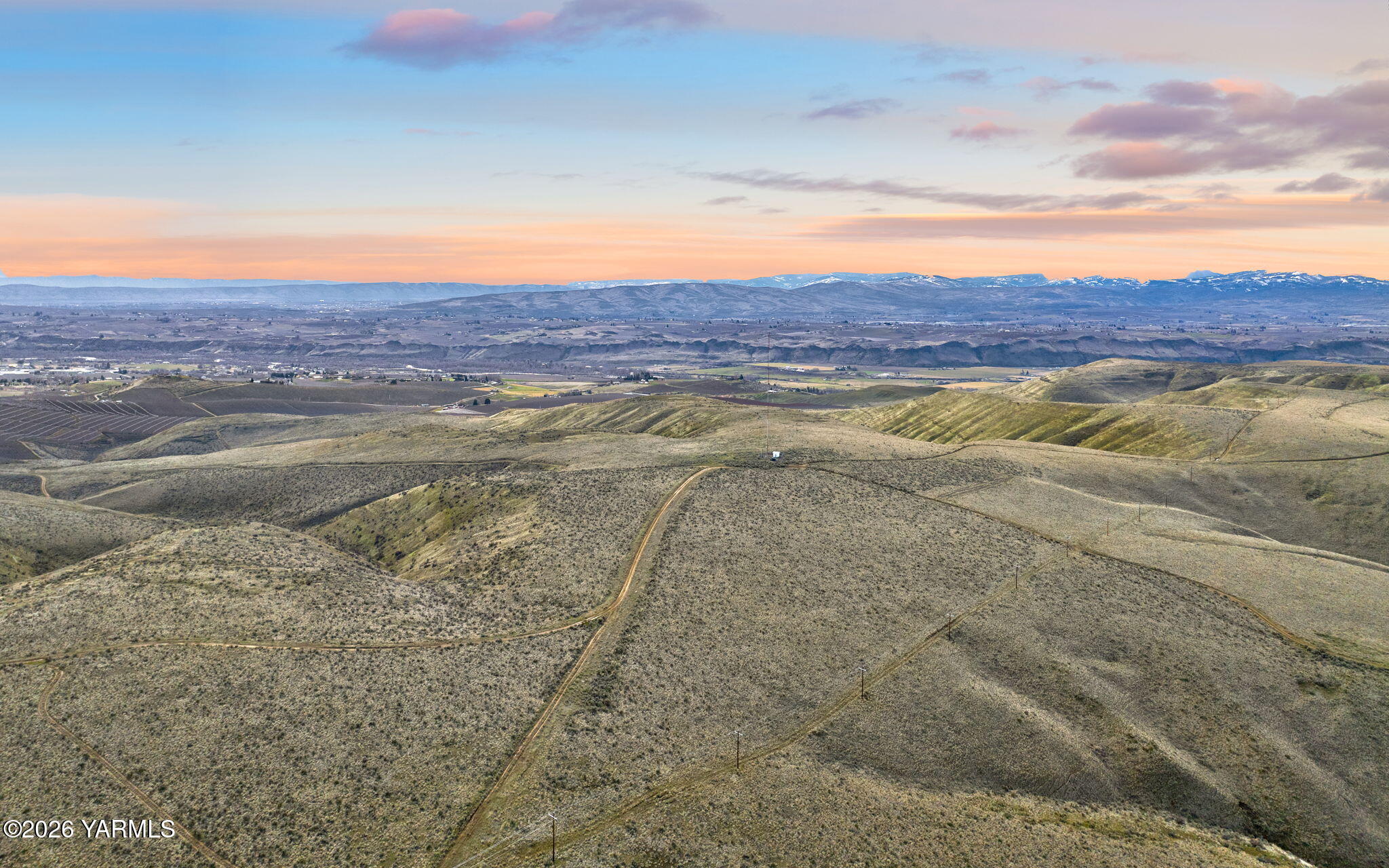 a view of an ocean and a mountain