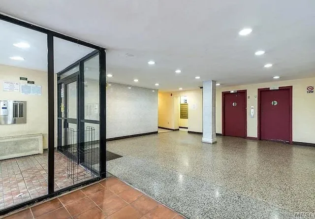 a view of a hallway with staircase
