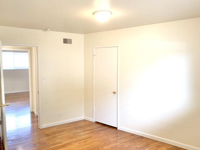 90 Quarterdeck Way Pacific Grove, CA 93950 - Photo 14 of 14 a view of a room with wooden floor