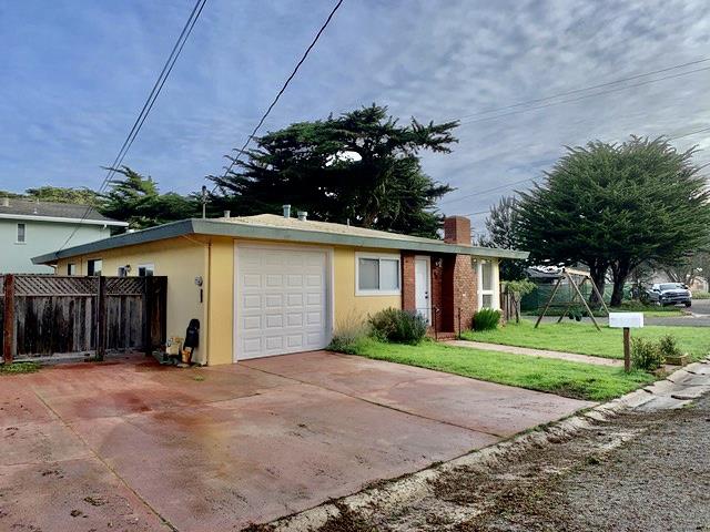 90 Quarterdeck Way Pacific Grove, CA 93950 - Photo 2 of 14 a view of a house with a yard and potted plants