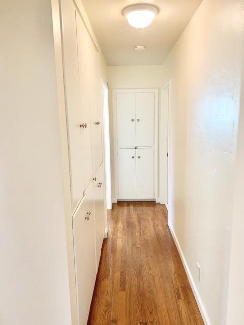 90 Quarterdeck Way Pacific Grove, CA 93950 - Photo 9 of 14 a view of a hallway with wooden floor