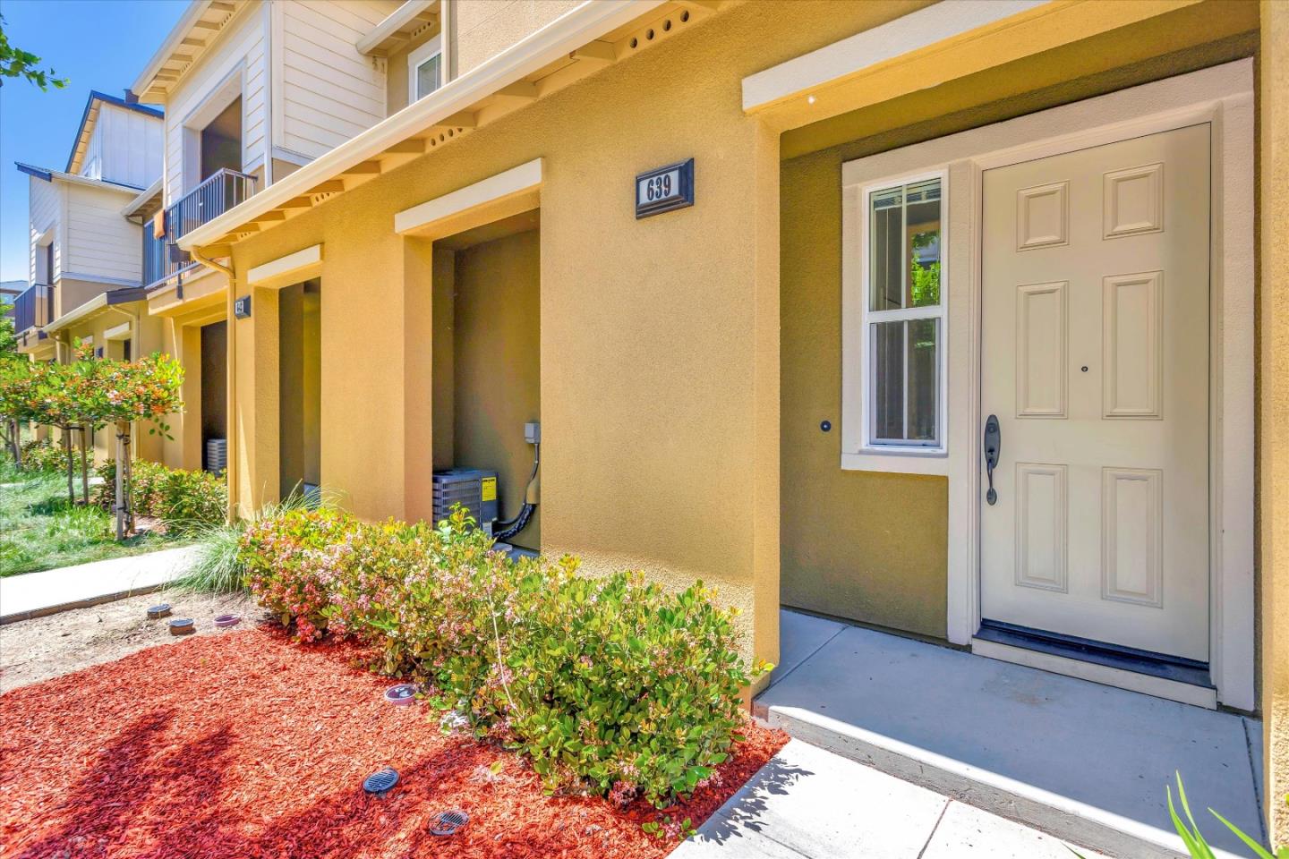639 Elderberry Drive Milpitas, CA 95035 - Photo 4 of 51 a front view of a house with a yard
