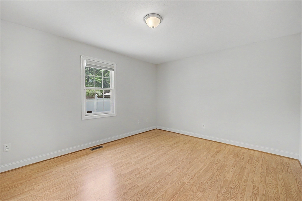 792 Ryan Road Northampton, MA 01062 - Photo 21 of 29 an empty room with a empty space and a window