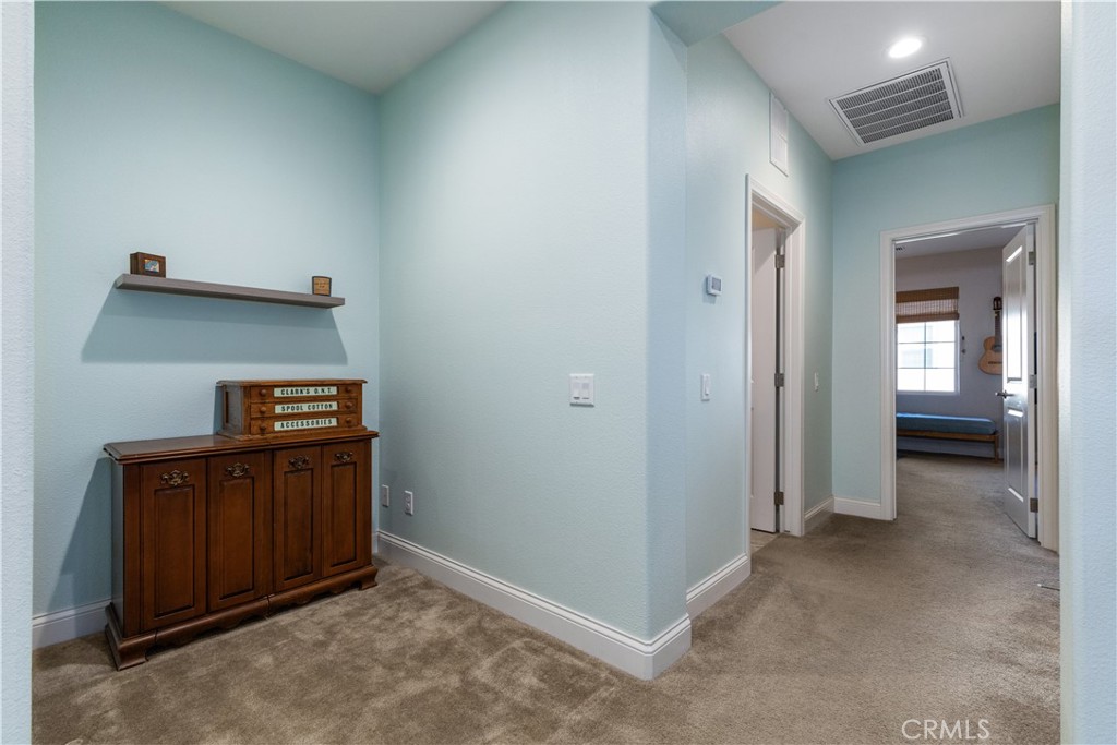 9354 Riberena Circle Atascadero, CA 93422 - Photo 22 of 47 an empty room with closet and wooden floor