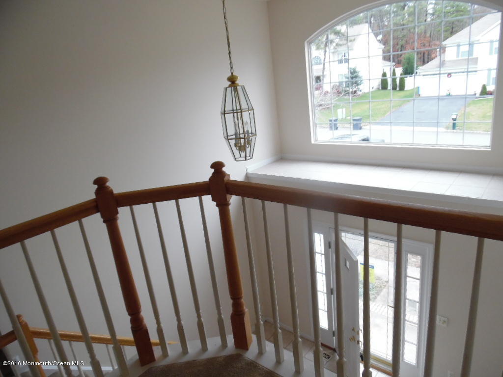 125 Swordfish Road Manahawkin, NJ 08050 - Photo 9 of 15 a view of stairs from a window