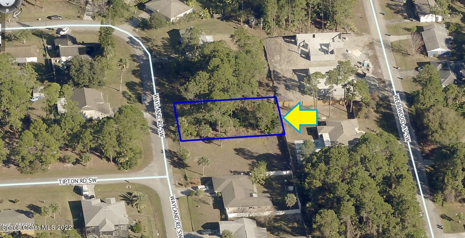 473 Wayland Road Southwest Palm Bay, FL 32908 - Photo 1 of 7 an aerial view of residential house with outdoor space and swimming pool