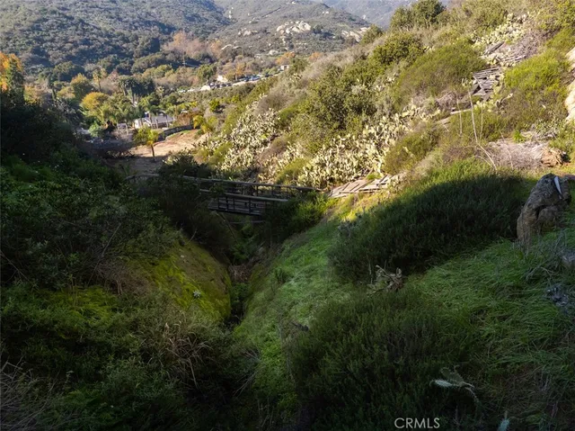 a view of car parked on street side with parking