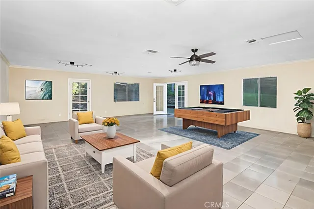 a kitchen with granite countertop a stove sink and cabinets