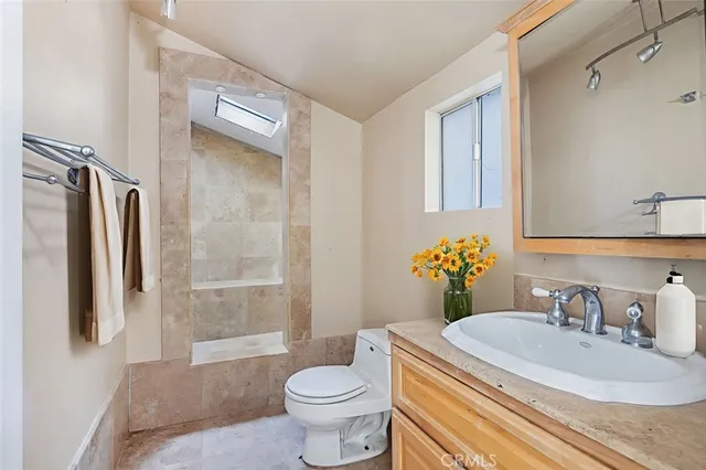 a view of an empty room with wooden walls