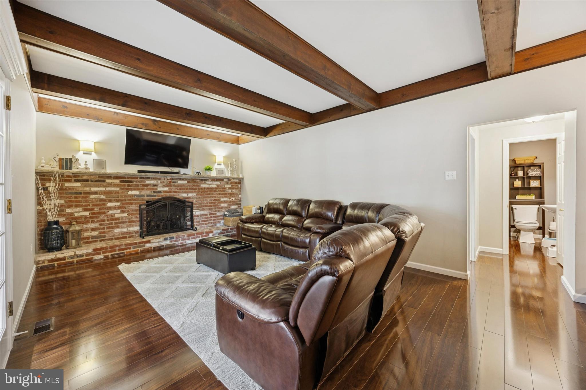 740 Grant Road Mount Laurel, NJ 08054 - Photo 15 of 35 a living room with furniture and a fireplace