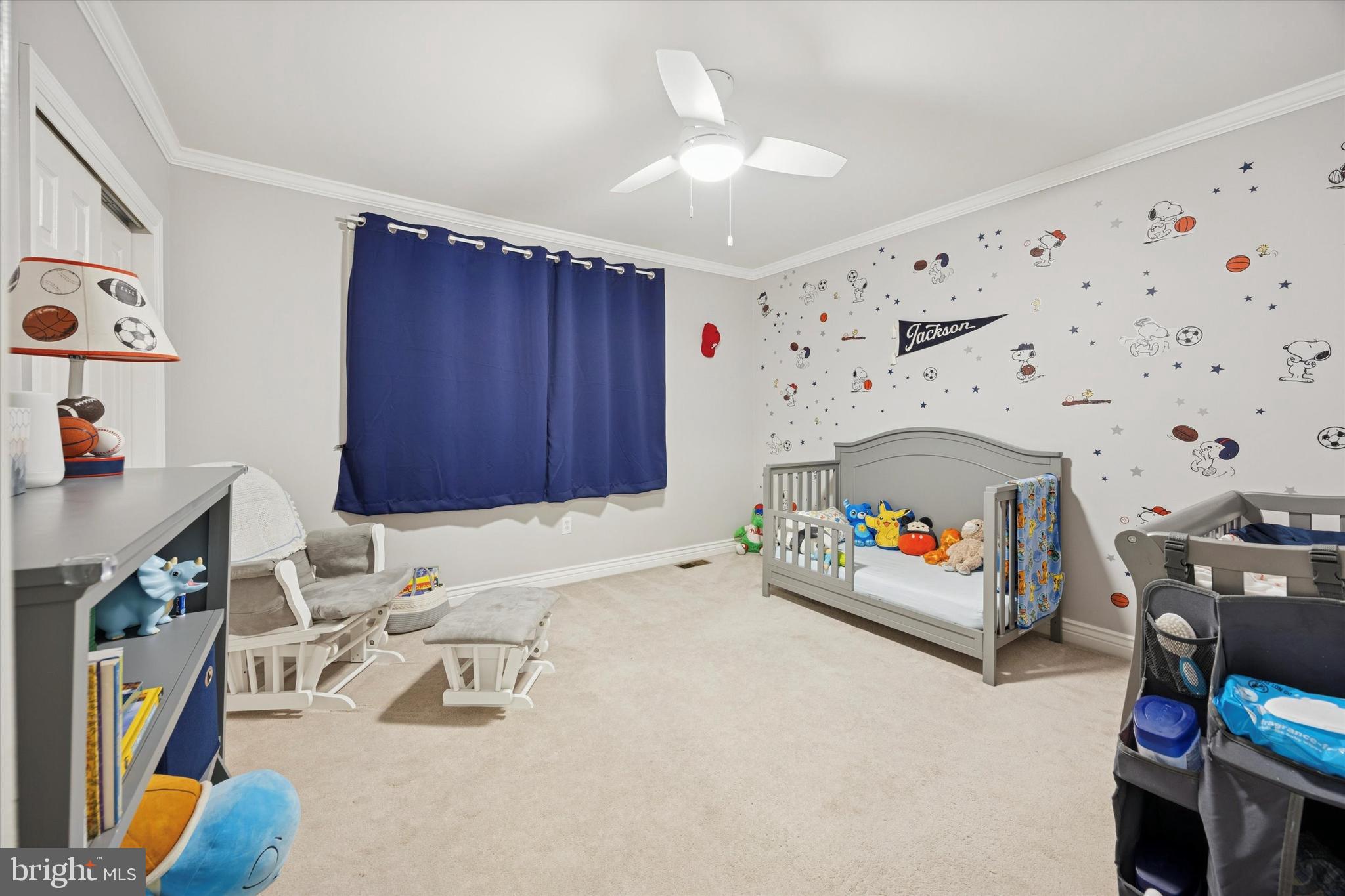 740 Grant Road Mount Laurel, NJ 08054 - Photo 29 of 35 a living room with furniture a baby crib and a couch