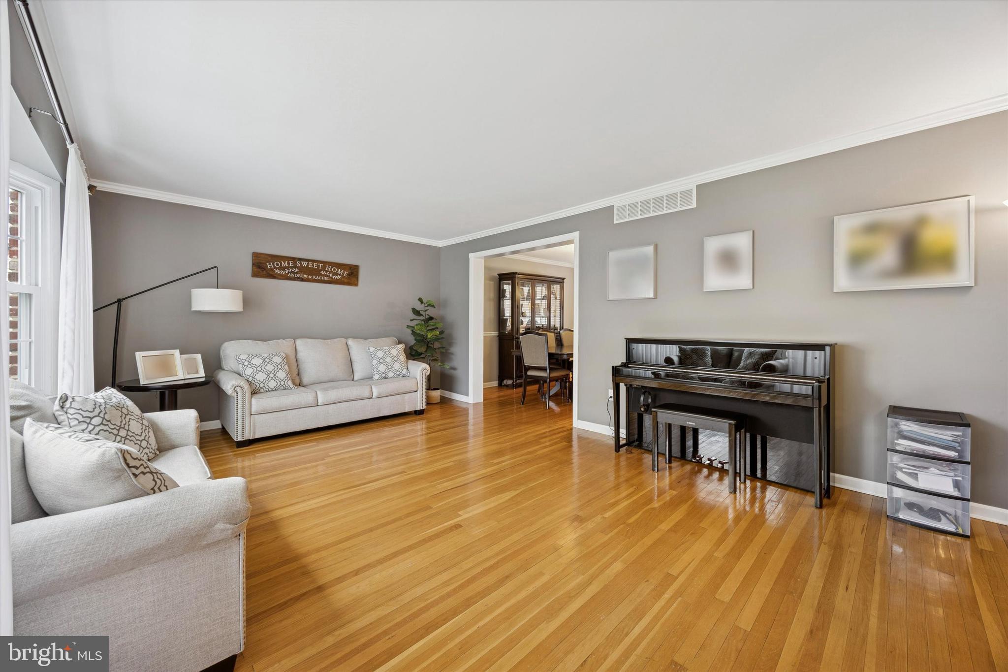 740 Grant Road Mount Laurel, NJ 08054 - Photo 5 of 35 a living room with furniture and a wooden floor