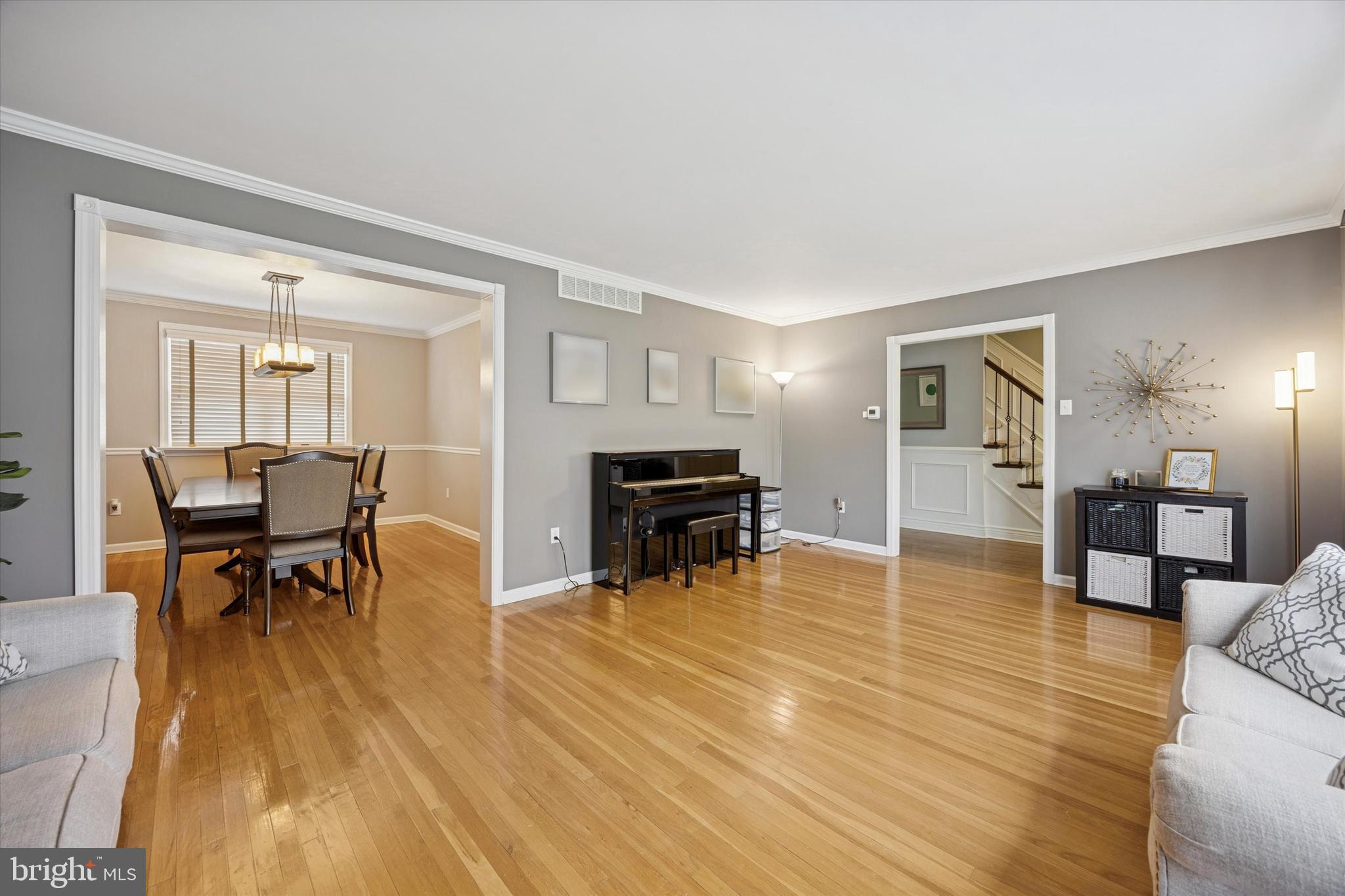 740 Grant Road Mount Laurel, NJ 08054 - Photo 7 of 35 a living room with furniture and a wooden floor