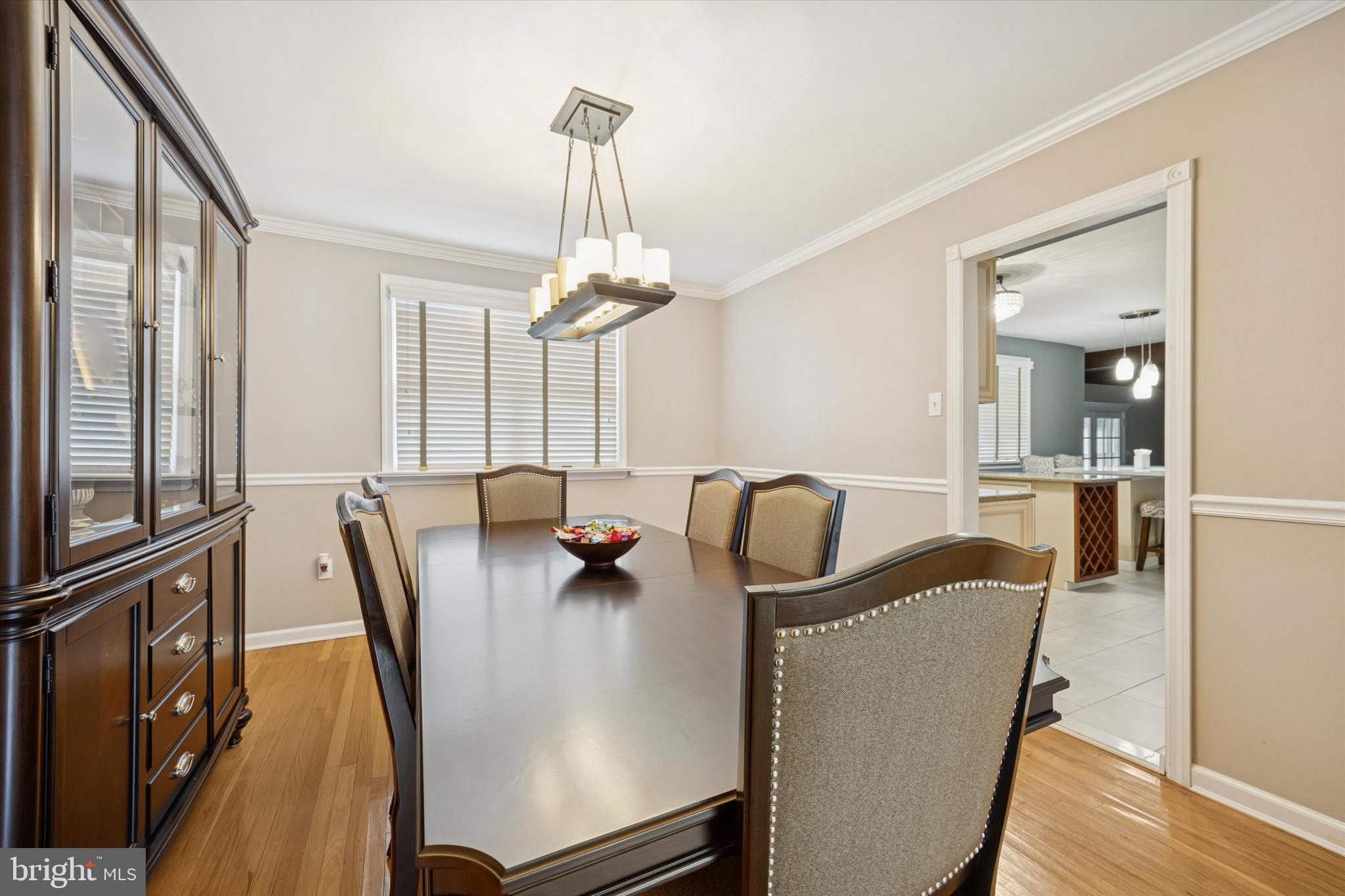 740 Grant Road Mount Laurel, NJ 08054 - Photo 8 of 35 a view of a dining room with furniture and wooden floor