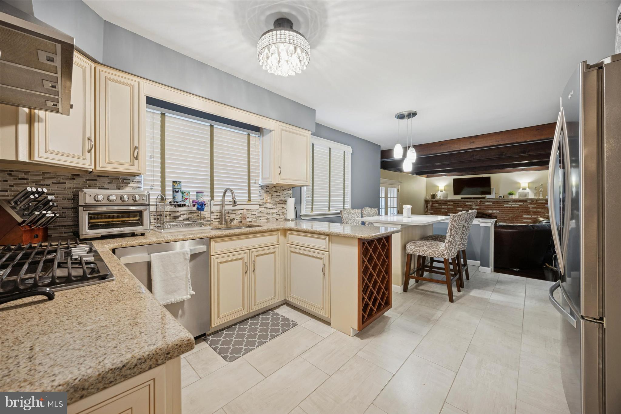 740 Grant Road Mount Laurel, NJ 08054 - Photo 10 of 35 a kitchen that has a lot of cabinets in it and appliances