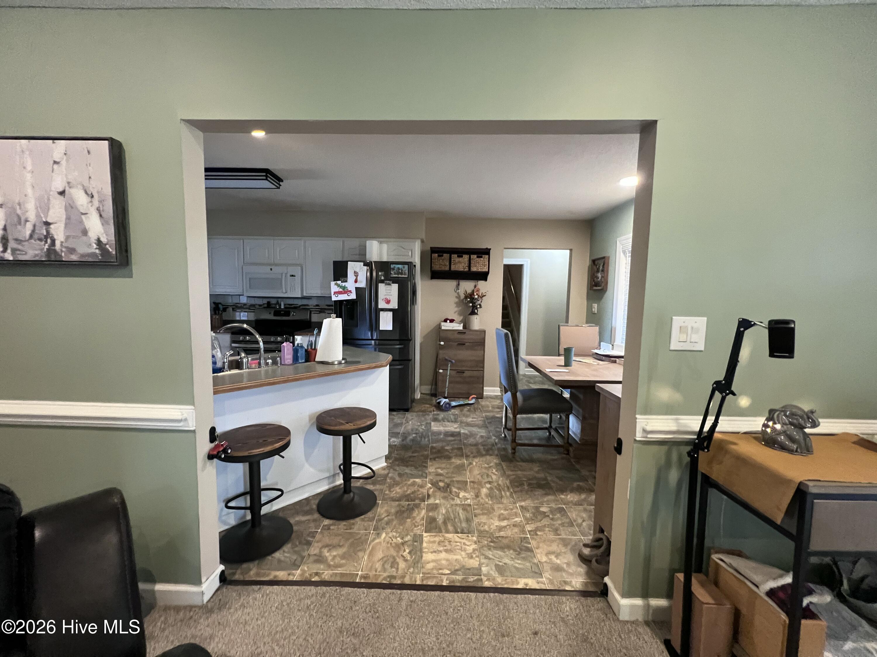 121 Ipock Loop Road Cove City, NC 28523 - Photo 11 of 45 View of Kitchen from the Living Room