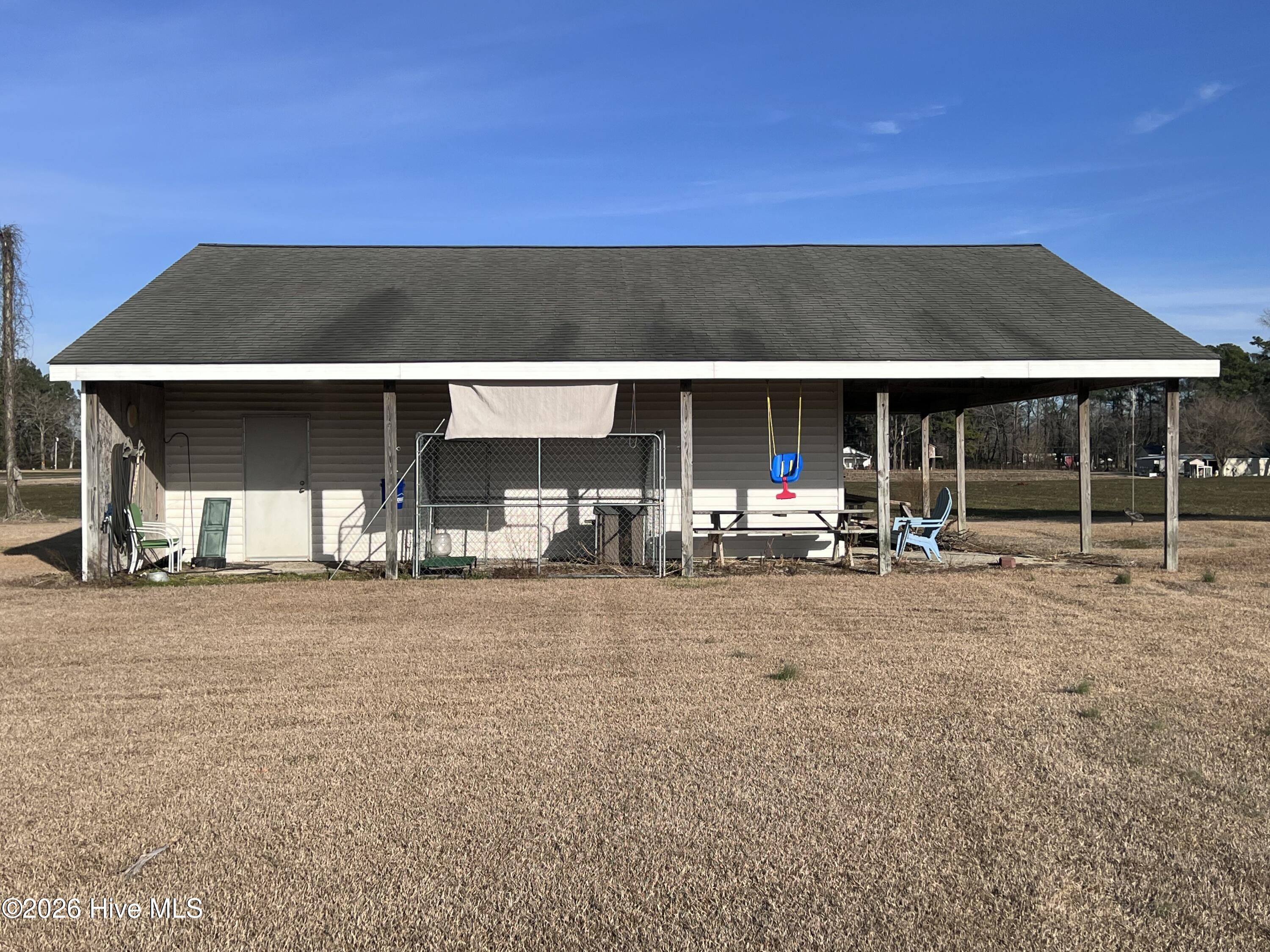 121 Ipock Loop Road Cove City, NC 28523 - Photo 39 of 45 Detached garage with side lean-to