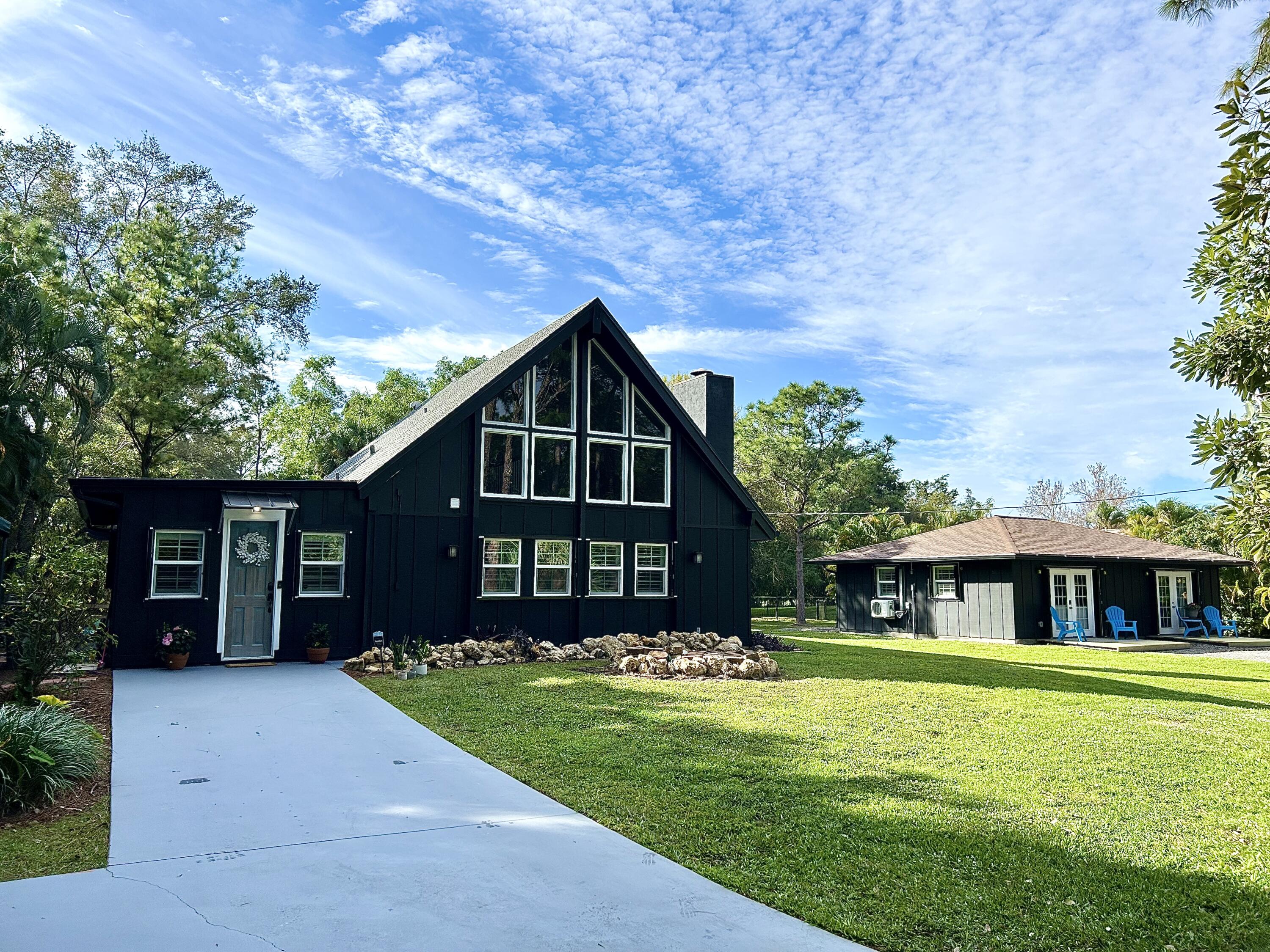 10730 154th Road North Jupiter, FL 33478 - Photo 1 of 60 Front View