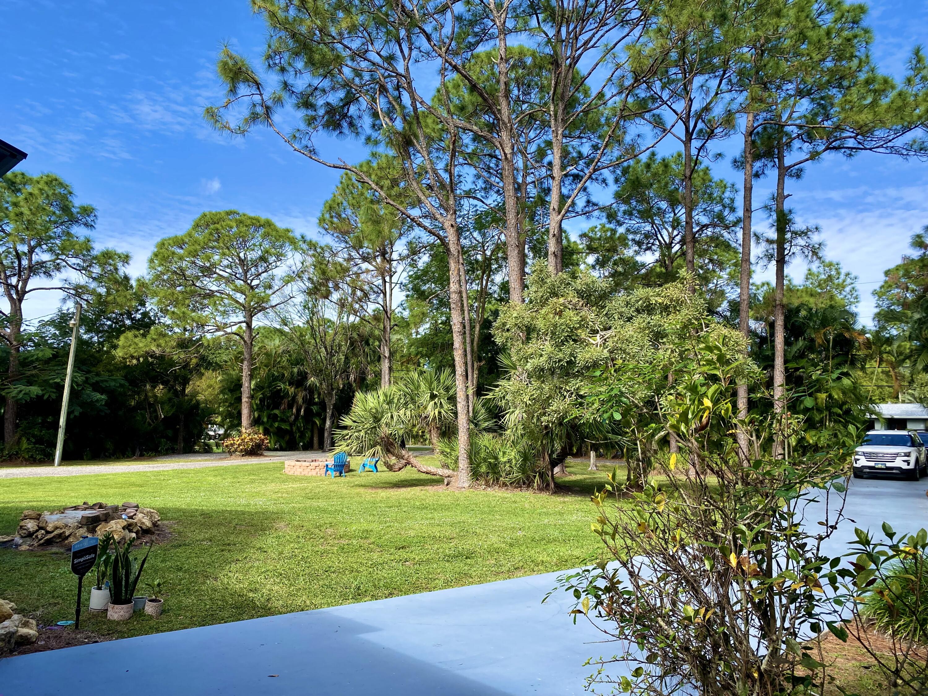 10730 154th Road North Jupiter, FL 33478 - Photo 52 of 60 Driveway Main House