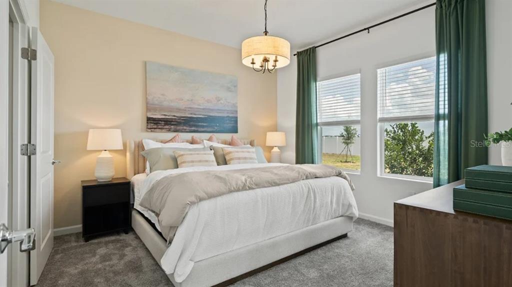 4246 St Thomas Way Kissimmee, FL 34758 - Photo 11 of 16 a bedroom with bed and window