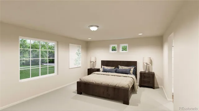 a bedroom with a large bed and a window