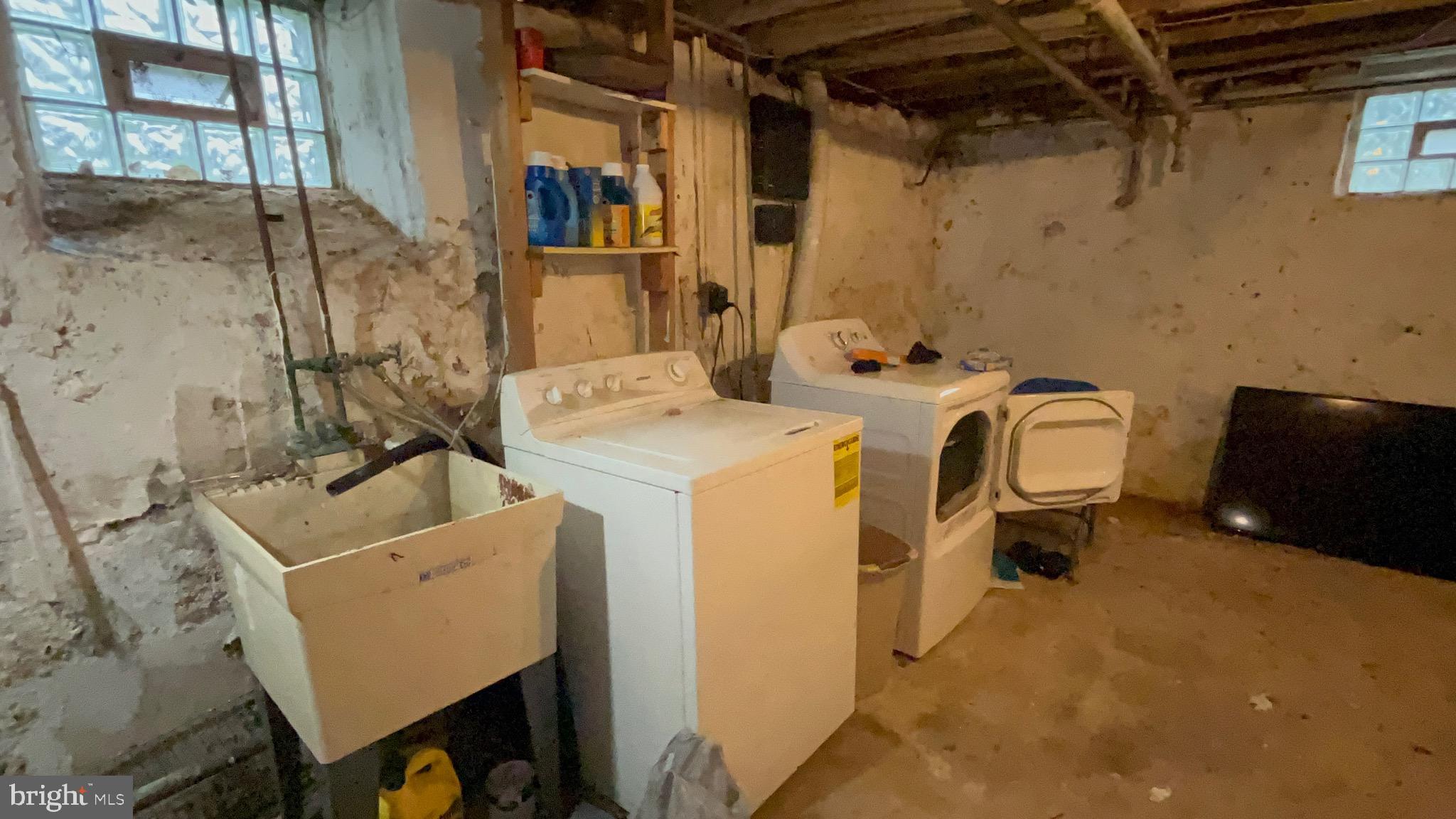 800 Bullock Avenue Lansdowne, PA 19050 - Photo 17 of 19 a utility room with dryer and washer