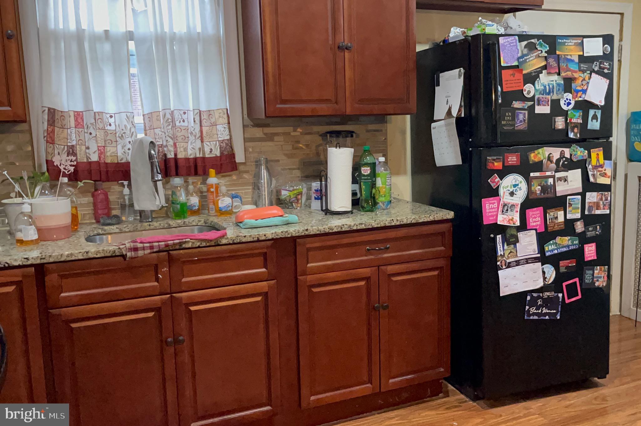 800 Bullock Avenue Lansdowne, PA 19050 - Photo 6 of 19 a kitchen with stainless steel appliances granite countertop a refrigerator and a stove top oven