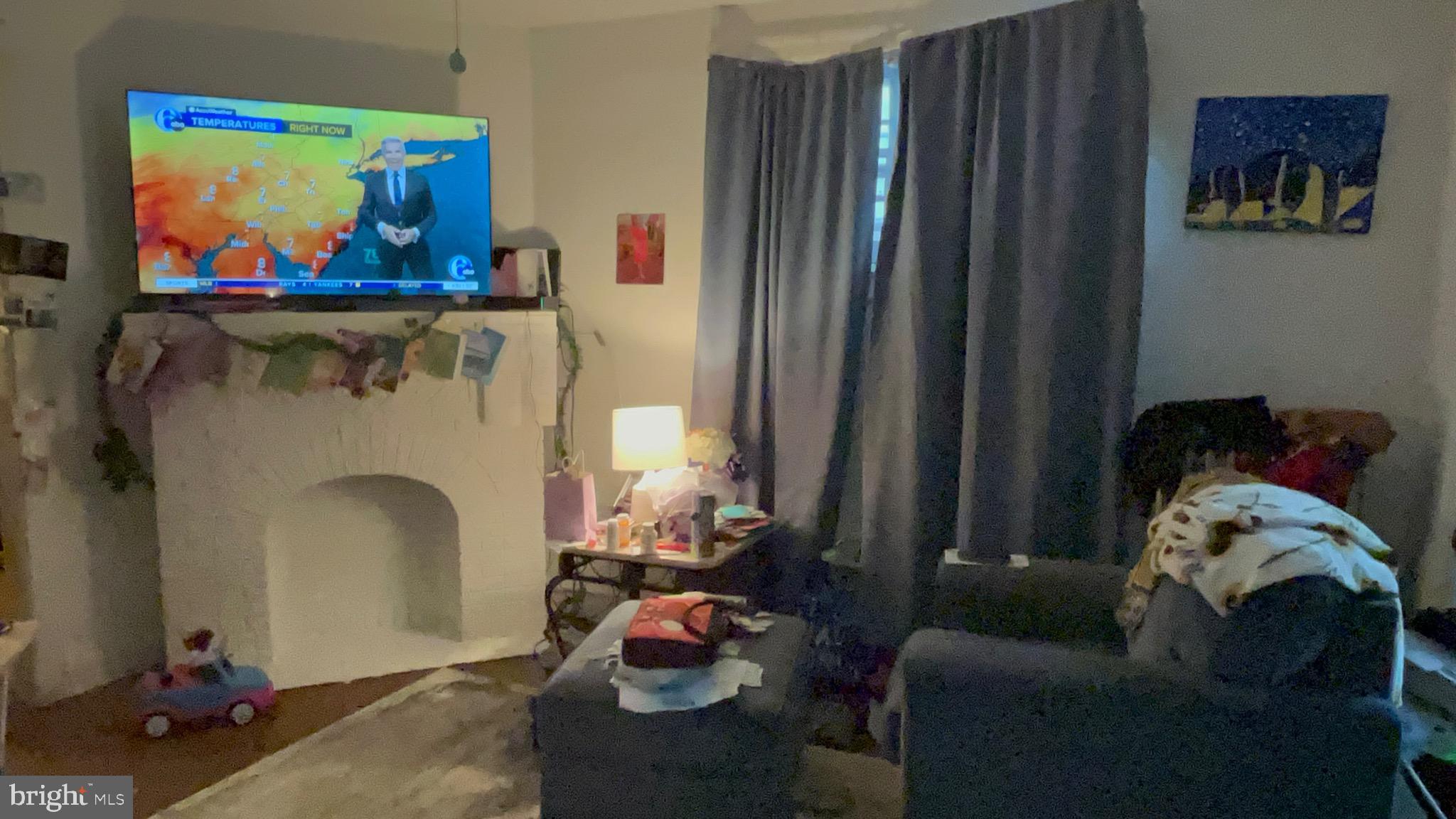 800 Bullock Avenue Lansdowne, PA 19050 - Photo 9 of 19 a living room with furniture and a painting on the wall