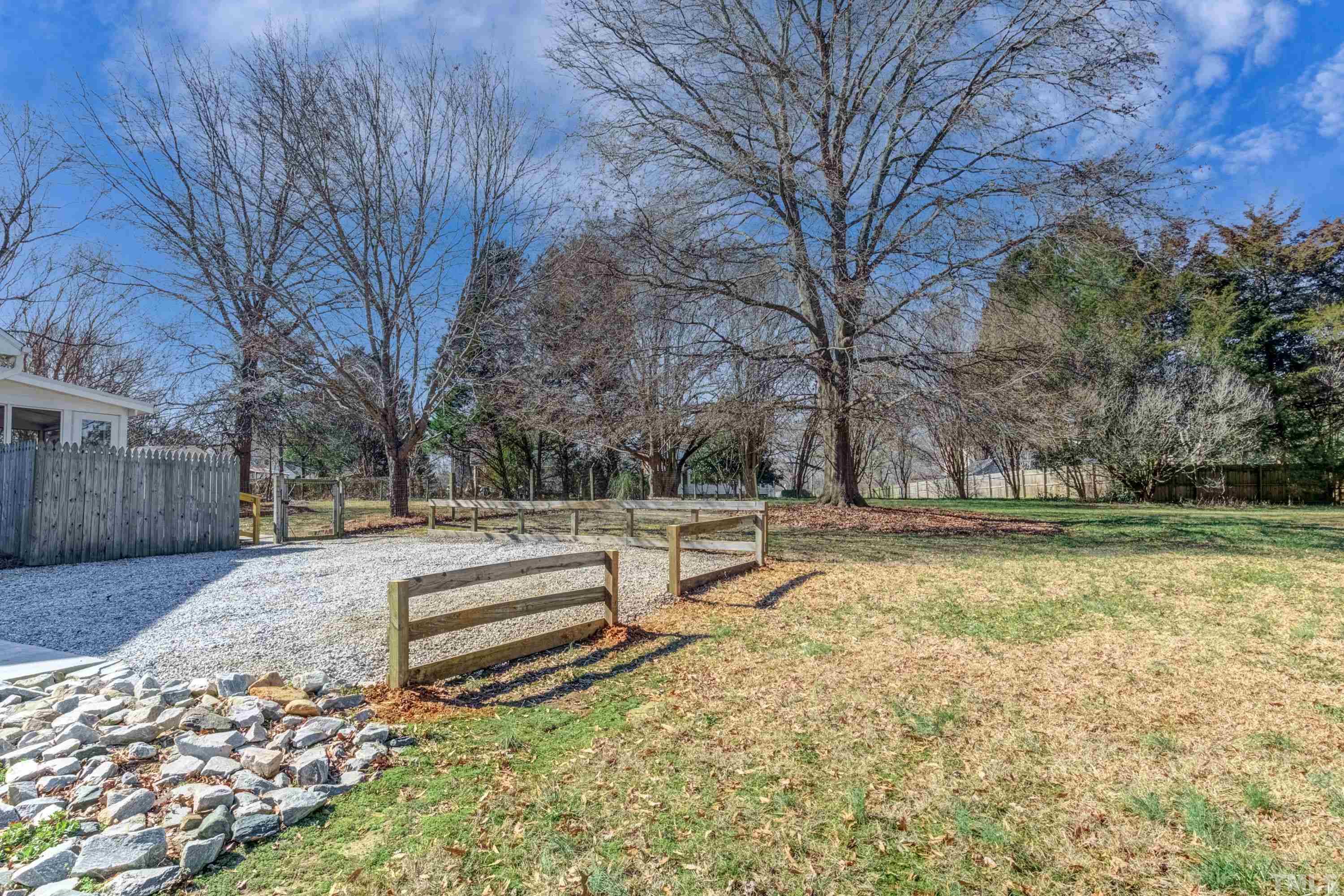 9305 Tallgrass Road Raleigh, NC 27603 - Photo 11 of 49 a view of backyard with trees