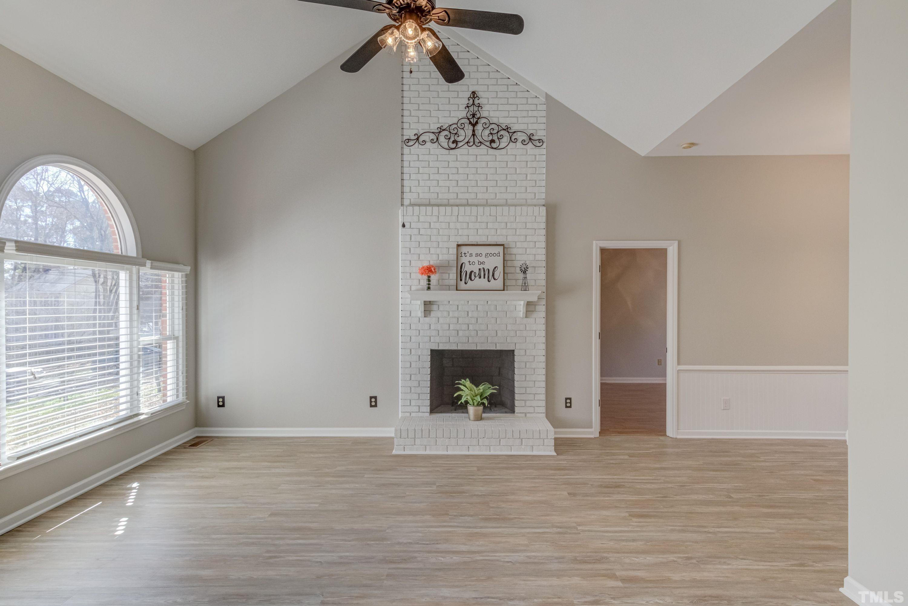 9305 Tallgrass Road Raleigh, NC 27603 - Photo 20 of 49 a view of a livingroom with a fireplace