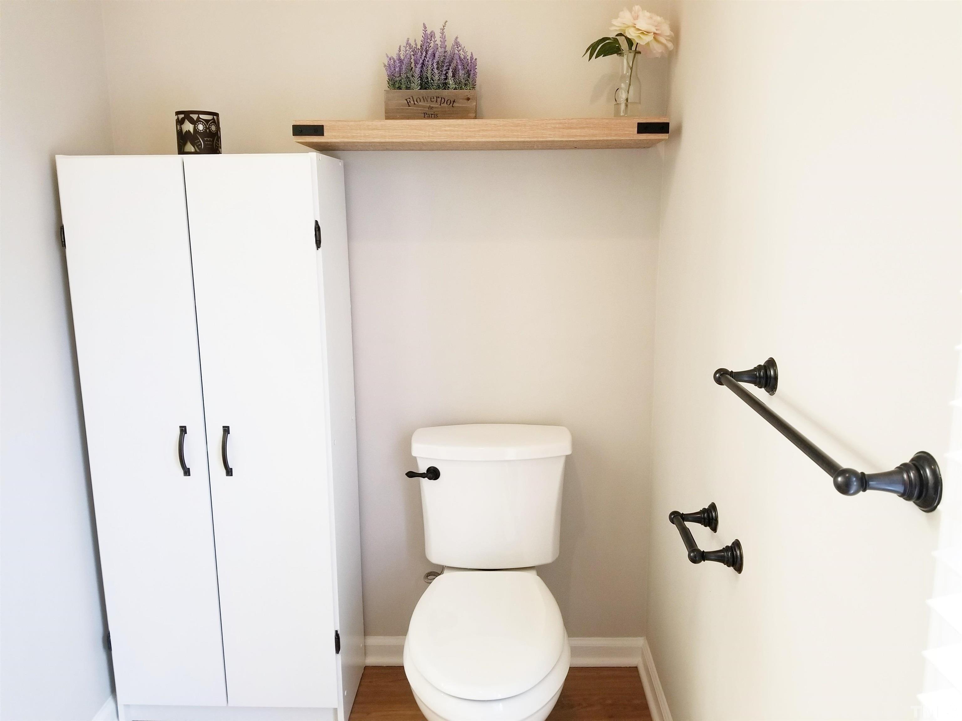 9305 Tallgrass Road Raleigh, NC 27603 - Photo 31 of 49 a bathroom with a toilet and a shower