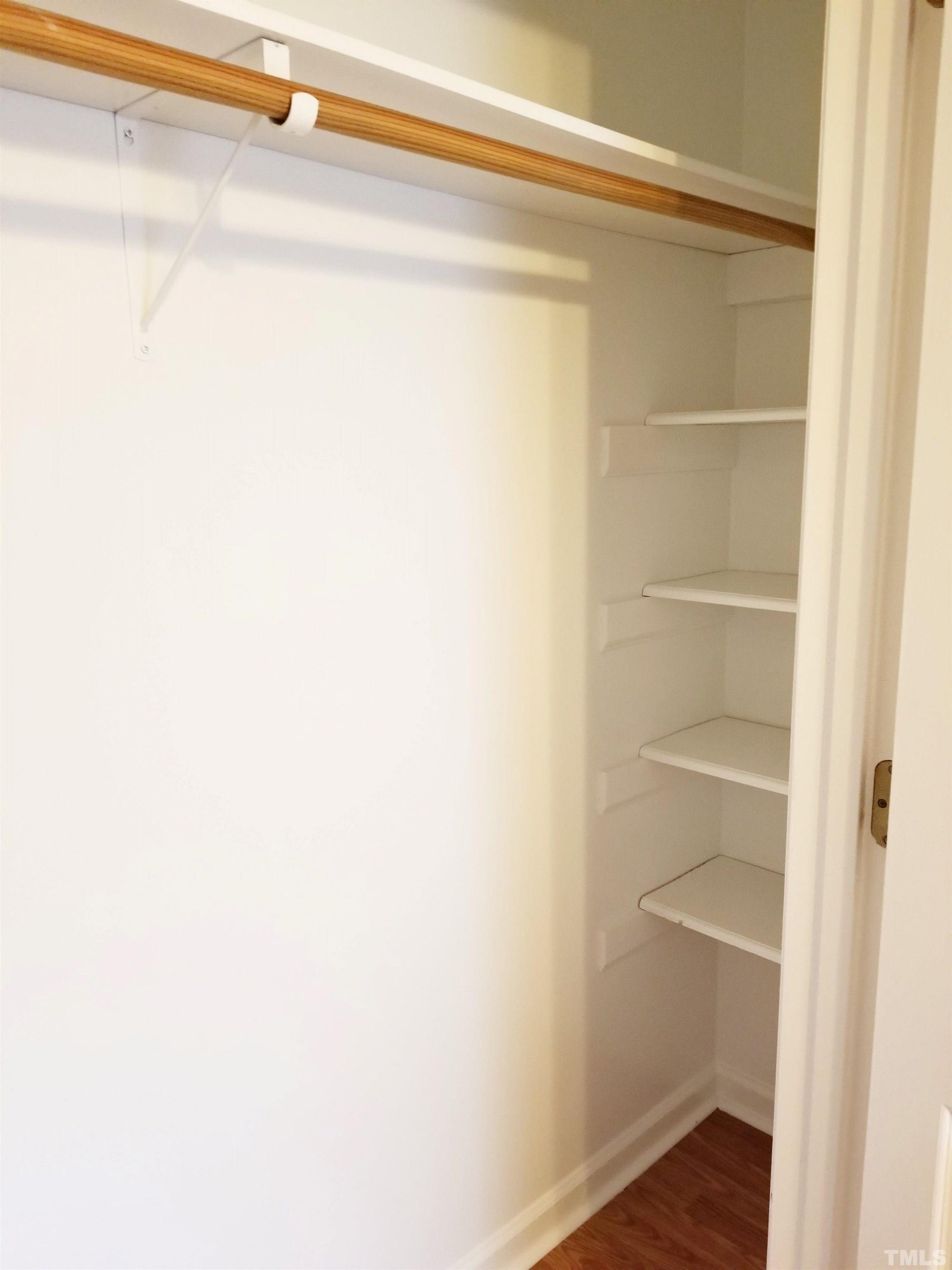 9305 Tallgrass Road Raleigh, NC 27603 - Photo 42 of 49 a view of a room with rack on the wall