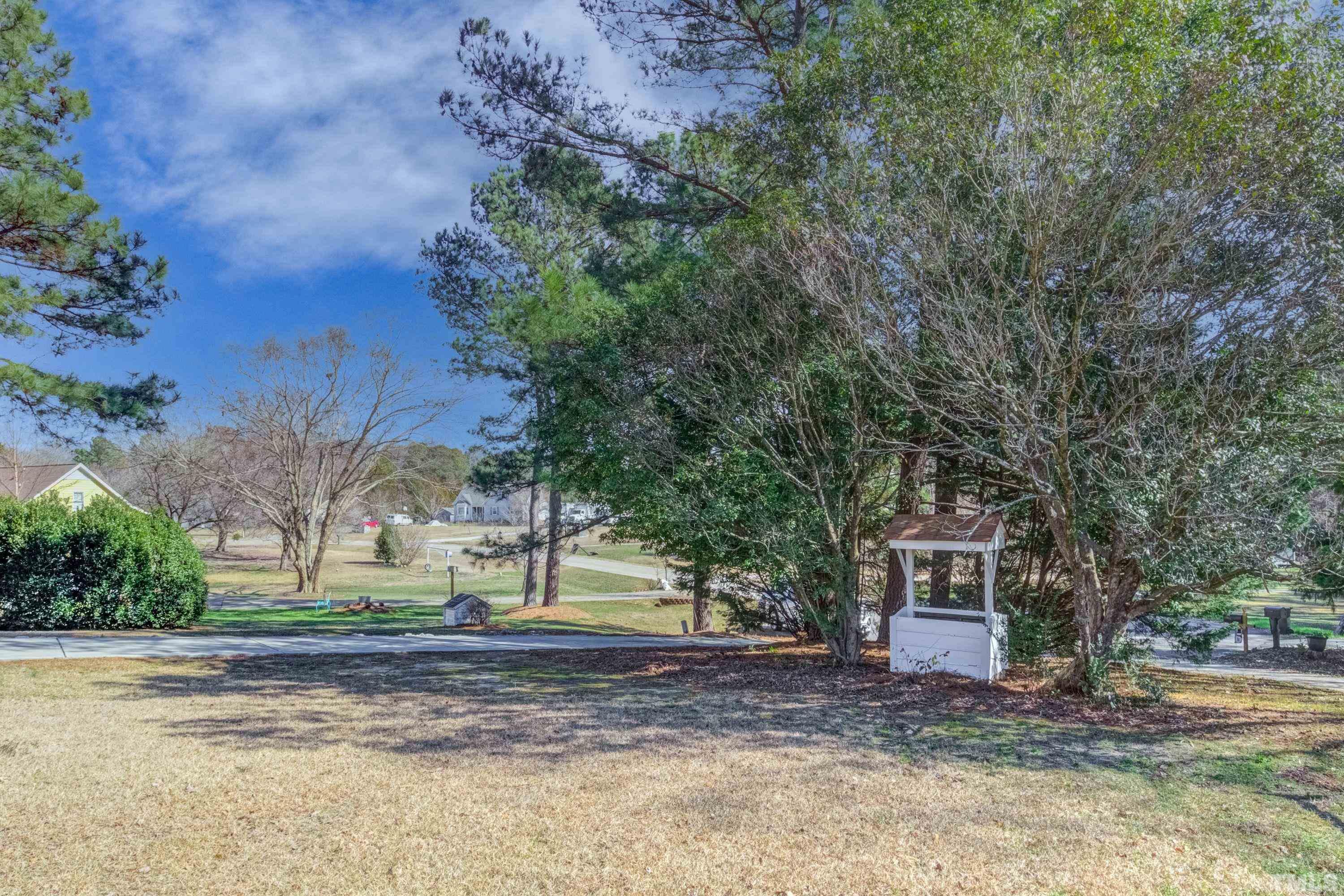 9305 Tallgrass Road Raleigh, NC 27603 - Photo 9 of 49 a view of yard with tree in front of it