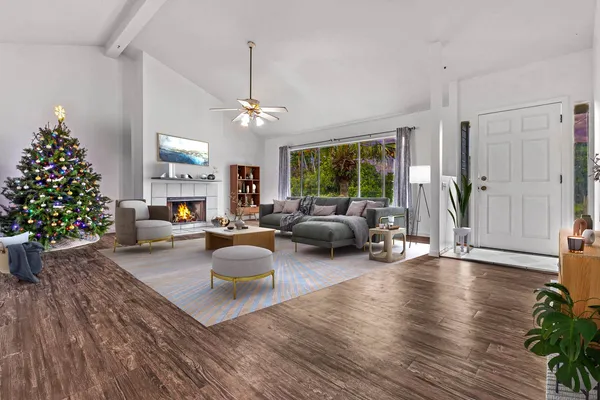 a living room with furniture or a chandelier and a wooden floor