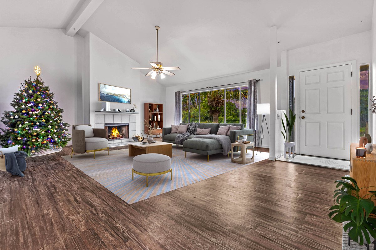 a living room with furniture or a chandelier and a wooden floor