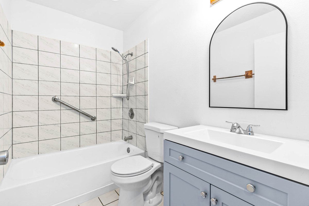 4806 Iiwi Road Kapaa, HI 96746 - Photo 9 of 30 a bathroom with a sink a toilet and shower