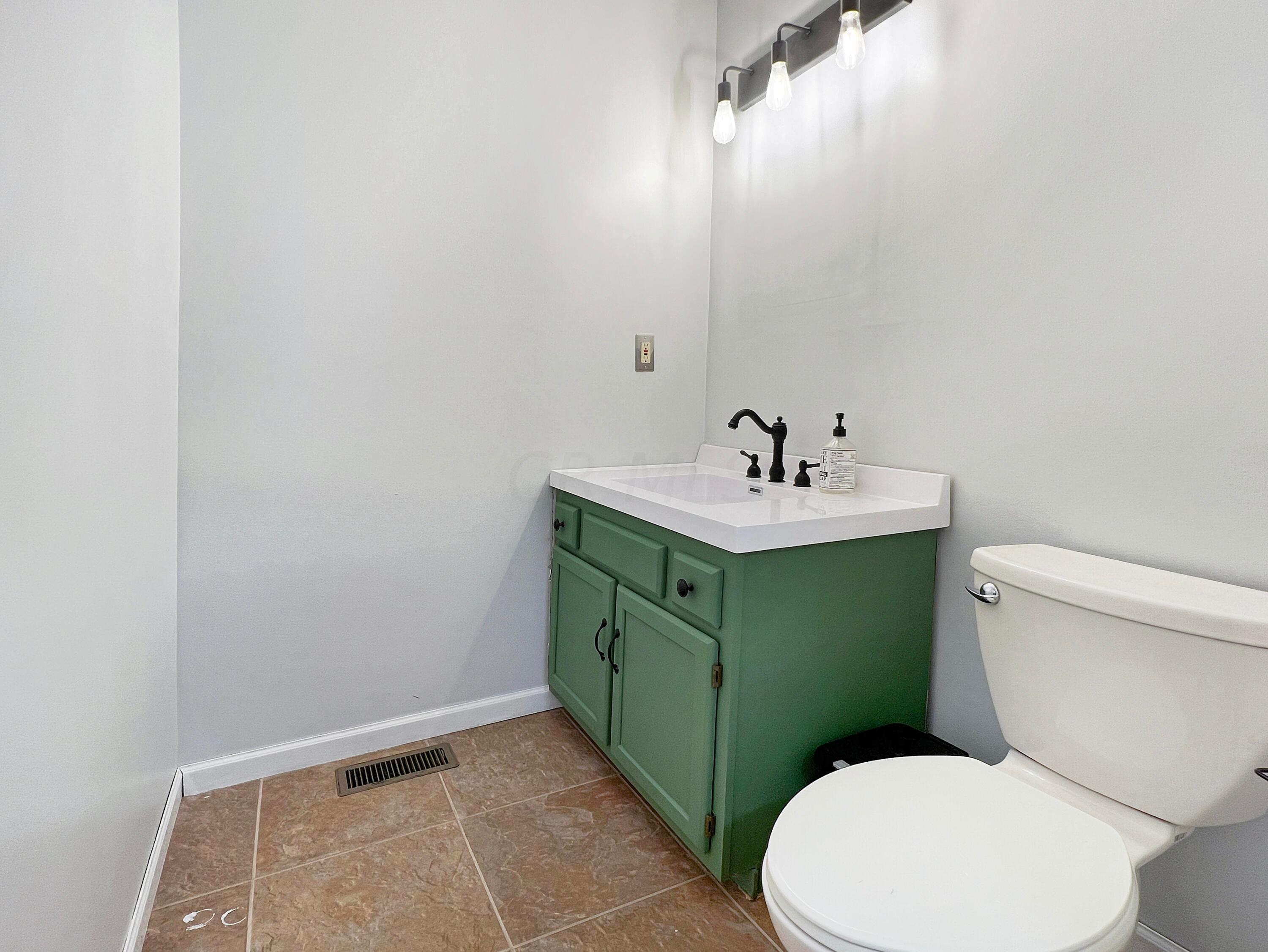 977 Jasper-Coil Road Washington Court House, OH 43160 - Photo 8 of 27 Downstairs half bath