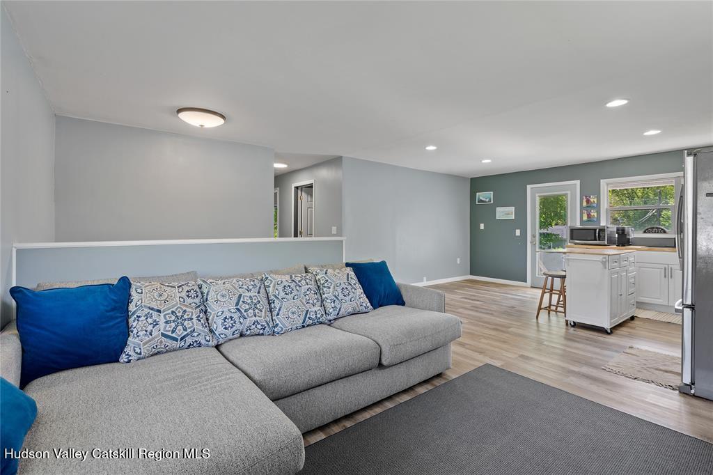 69 Mossybrook Road High Falls, NY 12440 - Photo 11 of 36 a living room with furniture and a large window