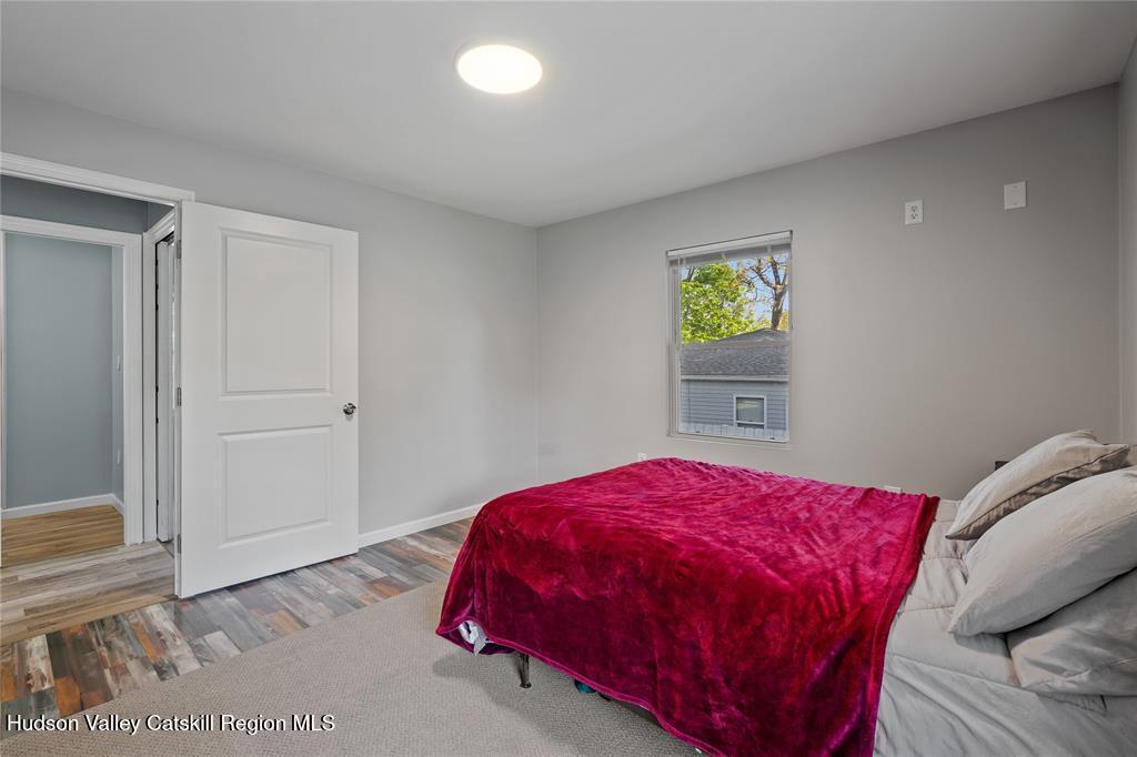 69 Mossybrook Road High Falls, NY 12440 - Photo 13 of 36 a bedroom with a bed and a window