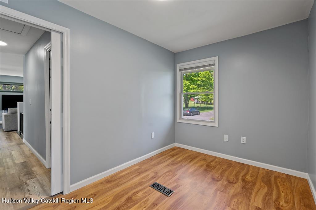 69 Mossybrook Road High Falls, NY 12440 - Photo 17 of 36 a view of empty room with wooden floor
