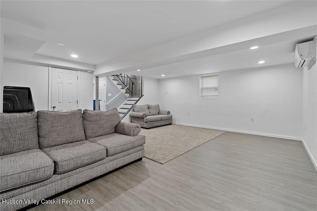 69 Mossybrook Road High Falls, NY 12440 - Photo 18 of 36 a living room with furniture and a couch