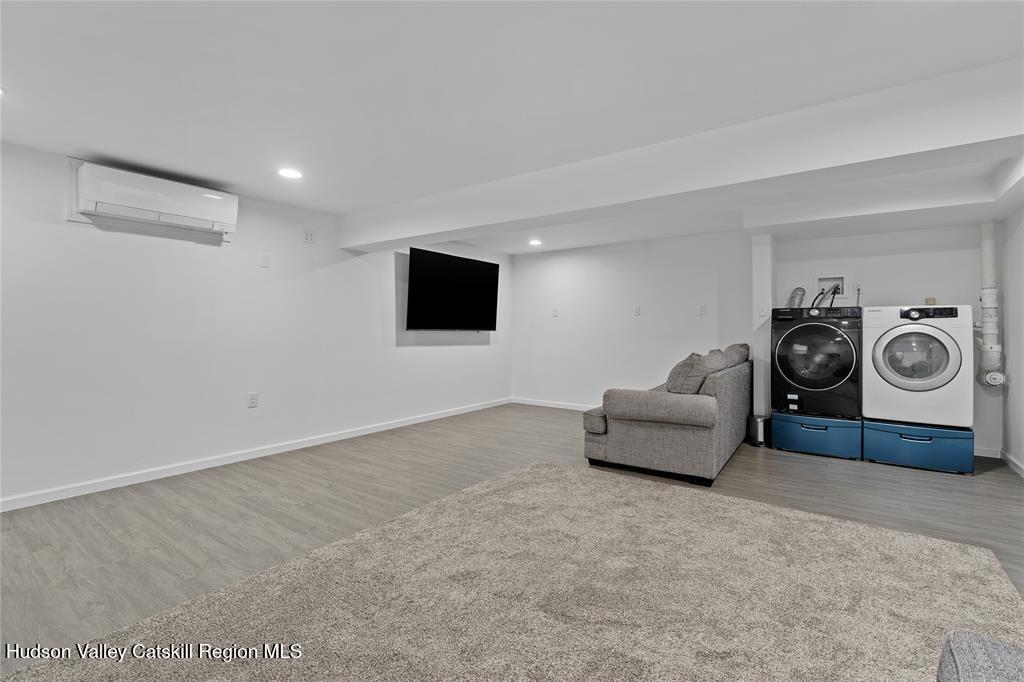 69 Mossybrook Road High Falls, NY 12440 - Photo 19 of 36 a living room with furniture and a flat screen tv