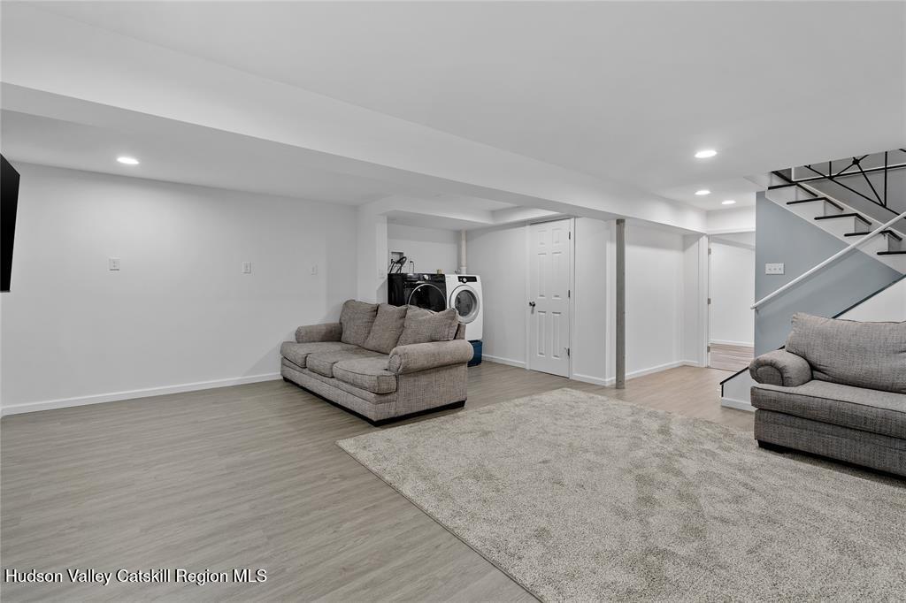 69 Mossybrook Road High Falls, NY 12440 - Photo 20 of 36 a living room with furniture and a couch