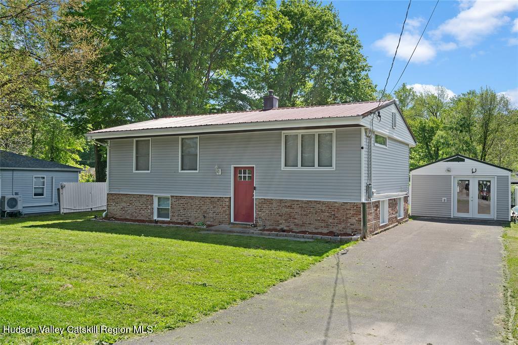 69 Mossybrook Road High Falls, NY 12440 - Photo 2 of 36 a front view of house with yard and green space